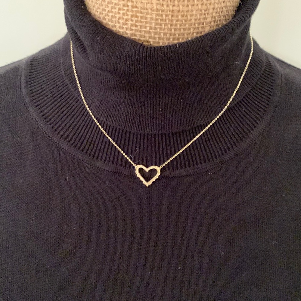 “Wearing My Heart On My Sleeve” Kendra Scott Ari open heart necklace.